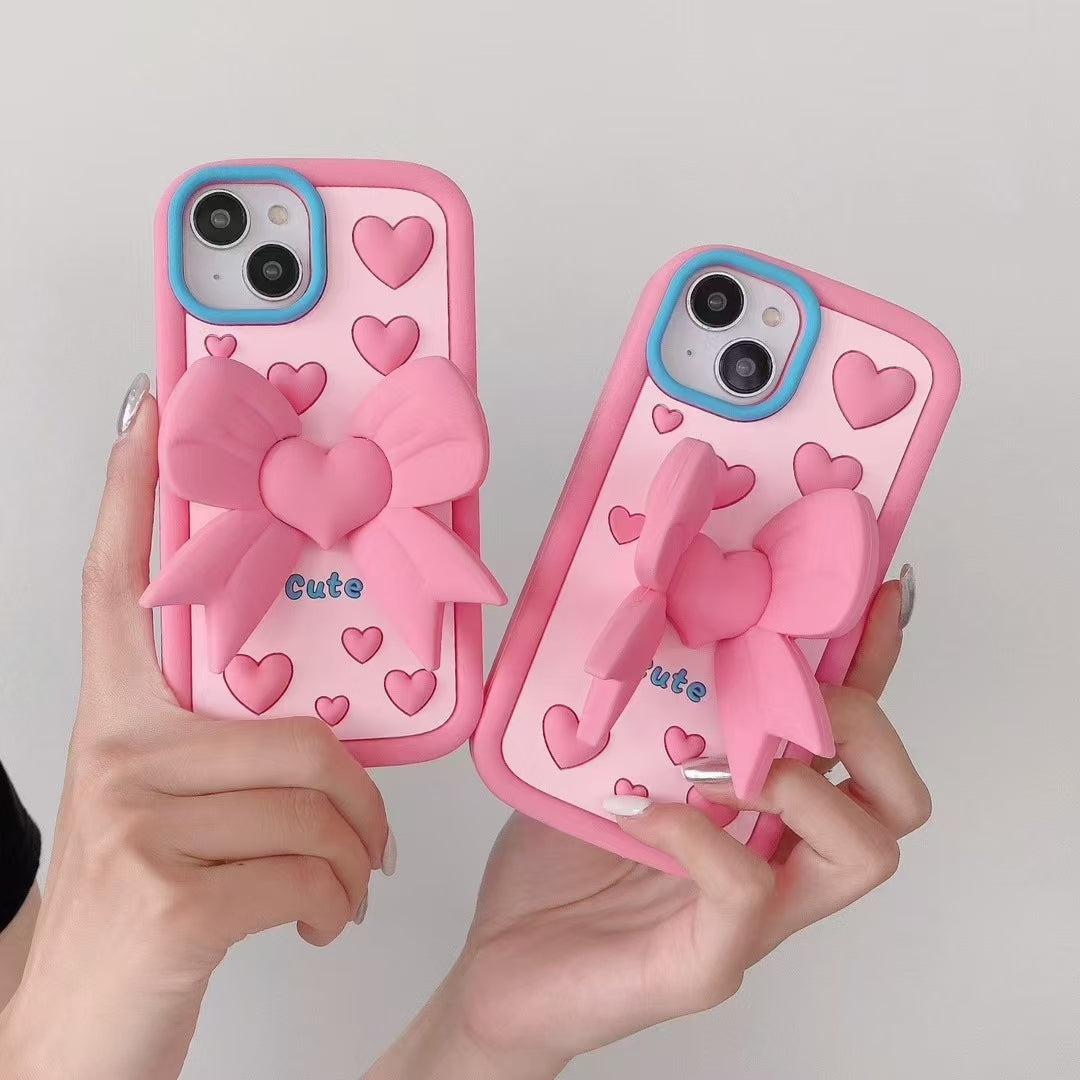 Pink Heart With Bow Stand Silicon Phone Cases For iPhone 16